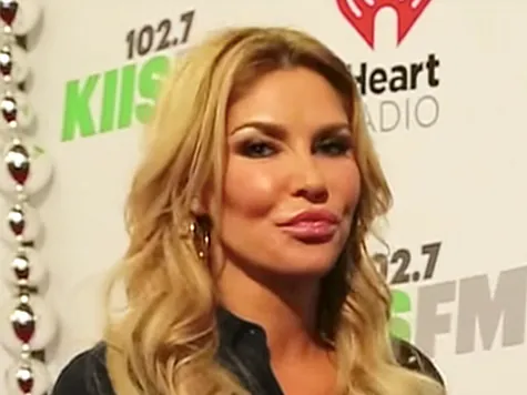 Did Brandi Glanville have a breast augmentation? Yes — a 20-year implant exchange
