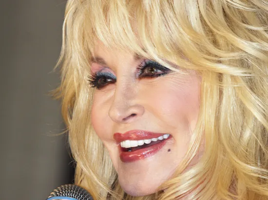 Did Dolly Parton have a breast augmentation? Yes — and she jokes about it openly