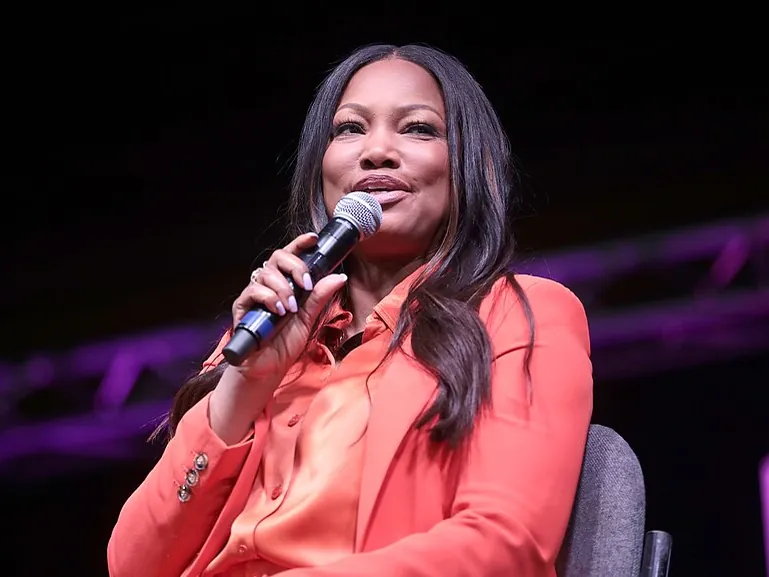 Did Garcelle Beauvais have breast implants? Yes — and she had them removed