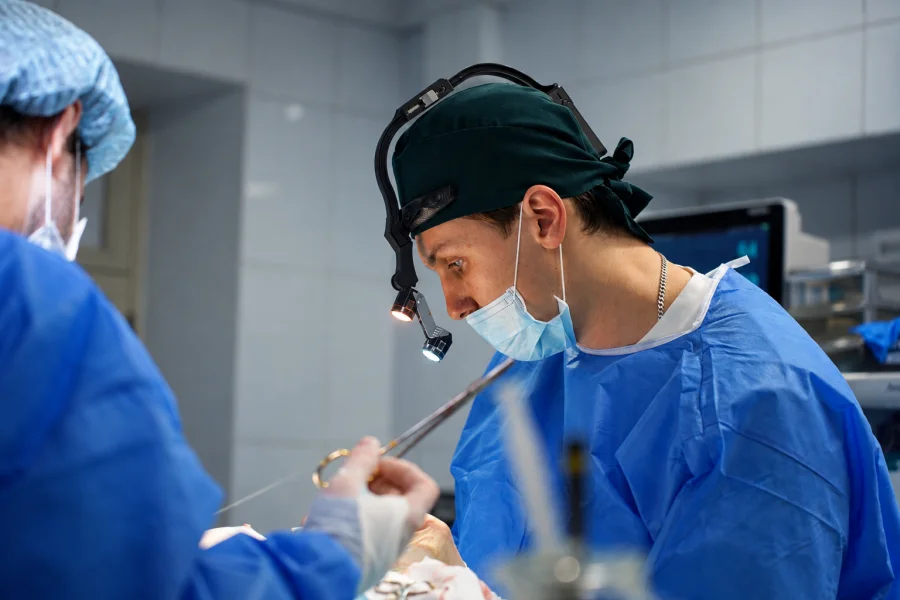 A plastic surgeon performs mammoplasty