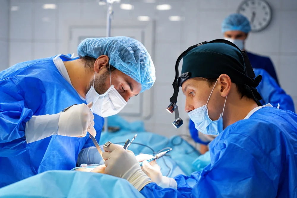 Surgeons during breast reduction surgery