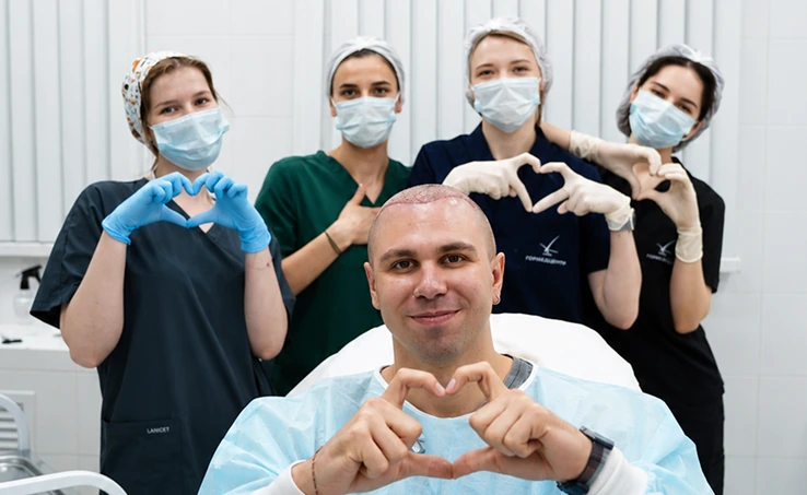 The City Medical Centre team with a patient after a hair transplant